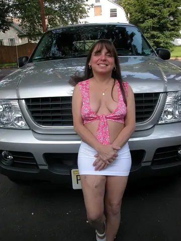 Petite Brunette MILF Masturbates with a Dildo in a Truck