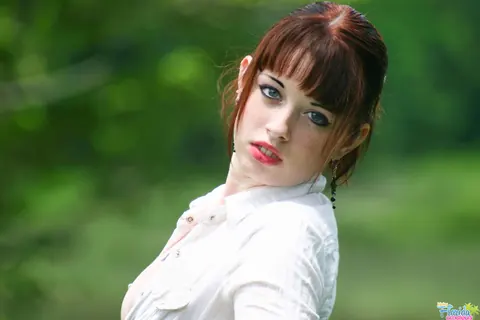 Busty Redhead Amateur Exposes Her Tits in a Forest – photo 1 of 12