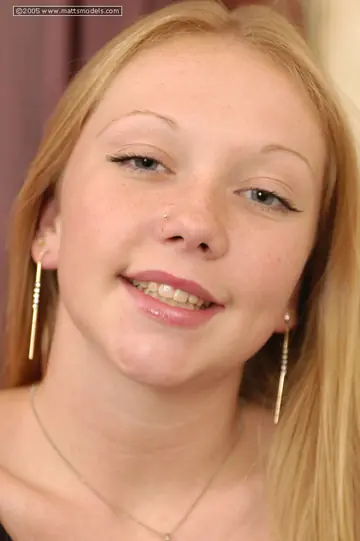 Blonde Strips Off Her Panties and Fingers Her Shaved Pussy