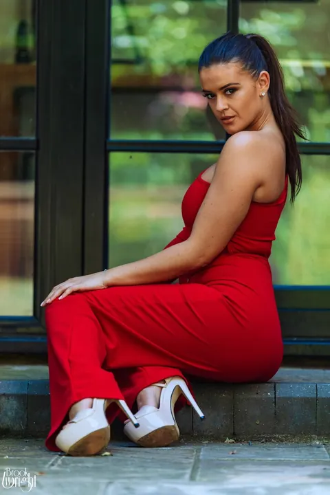 Brook Wright: British Brunette Reveals Her Big Tits After Red Pantsuit – photo 4 of 12