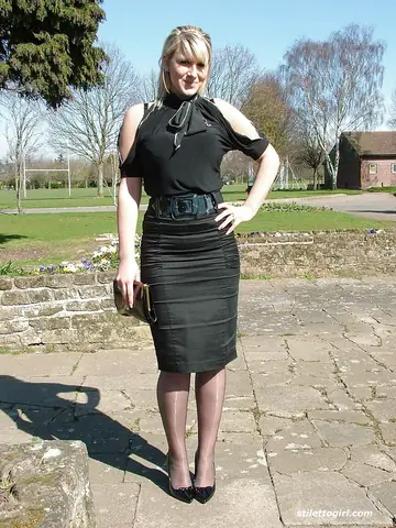 Demi Scott – Blonde PAWG Poses in a Skirt and High Heels Outdoors