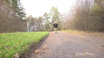 Natasha Ink – European Woman Pisses on a Rural Road with Hairy Pussy