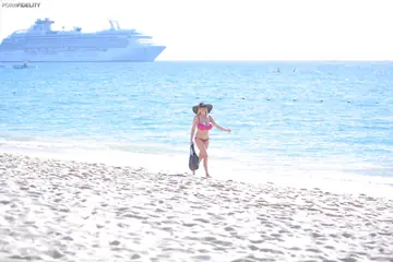 Kelly Madison – Tall Blonde MILF Poses in a Pink Bikini and Glasses on the Beach