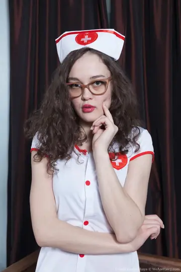 Ksenia Yankovskaya – Brunette Strips Off Her Nurse Uniform and Spreads Her Hairy Pussy