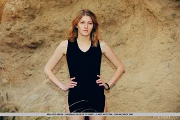 Mila I – Blonde PAWG Strips Out of Her Skirt on a Boulder