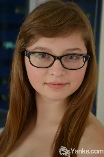 Brunette in Glasses Fingers Her Shaved Pussy