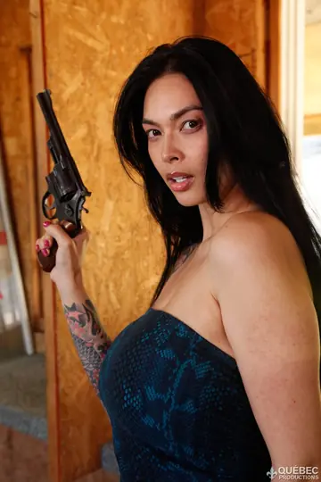 Tera Patrick – Asian MILF with Big Tits and Tattoos Poses Nude