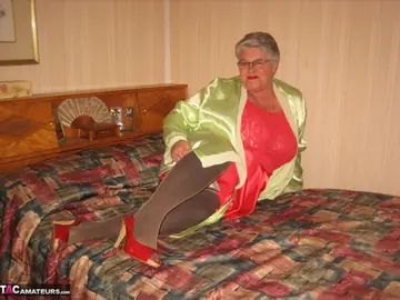 BBW in Stockings and Heels Strips and Fingers on the Bed