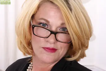 Kelsey Johnson – Mature Blonde in Heels and Glasses Spreads Her Hairy Pussy
