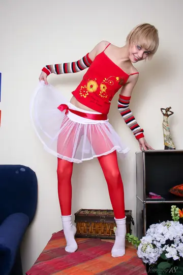 Woman with Short Hair Spreads Her Pussy