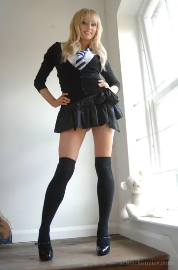 Elle Parker – Busty Blonde Strips Out of Her Uniform in Black Socks