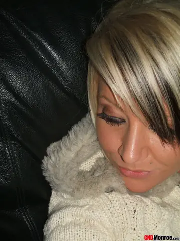 Blonde with Short Hair Shows Her Pierced Shaved Pussy
