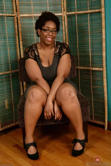 Chubby African Woman with Big Tits Shows Her Hairy Pussy