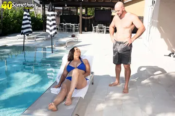 Gianna Chanel – Busty Brunette MILF in a Bikini Gives a Blowjob and Titjob Poolside