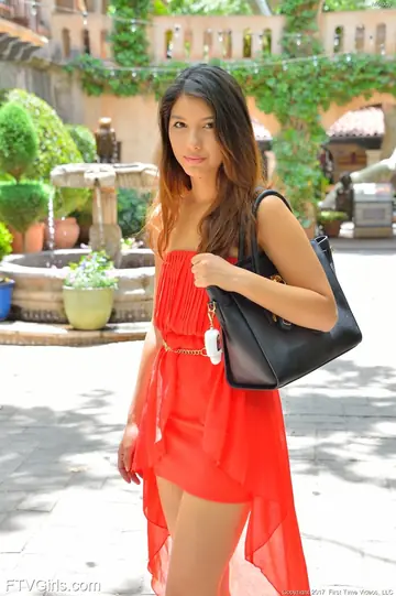 Melody Wylde – Asian Brunette in a Skirt and Heels Flashes Her Shaved Pussy Outdoors