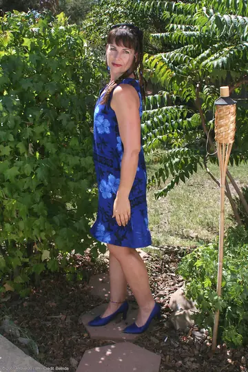 Thick Brunette MILF Strips Outdoors in a Skirt and Heels