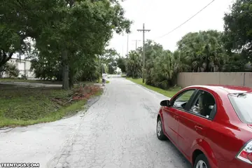 Pale European Blonde Gives a Blowjob in a Car