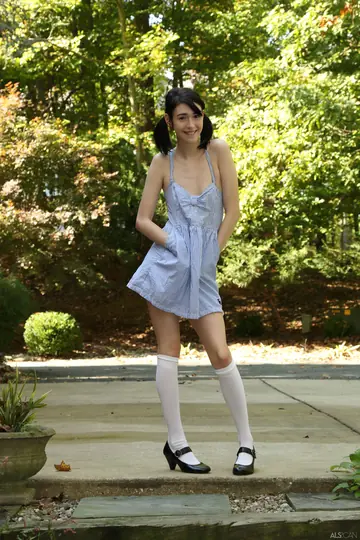 Ivy Aura – Petite Brunette in Pigtails Strips Outdoors in a Skirt