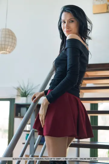 Alecto – Brunette in Stockings and Skirt Spreads Her Shaved Pussy Wide
