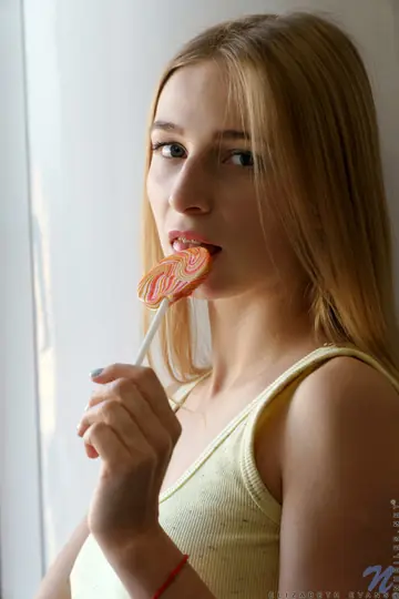 Elizabeth Evans – Blonde in Socks Fingers Her Shaved Pussy