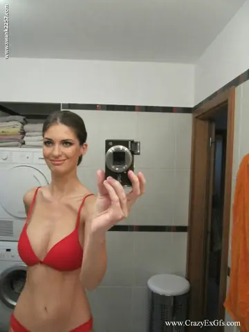 Busty Babe Strips Out of Her Lingerie in a Mirror Selfie