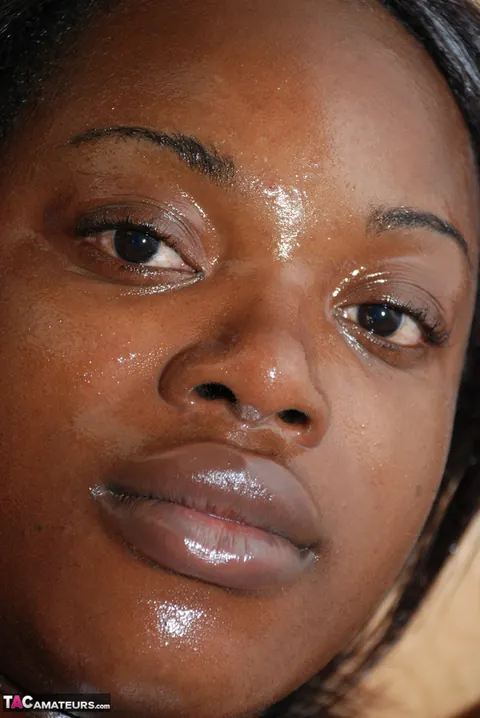 Thick Ebony Babe Oils Up Her Big Ass – photo 17 of 20