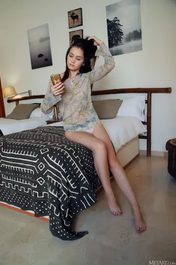 Kacy Lane – Slim Tattooed Brunette Poses on the Bed