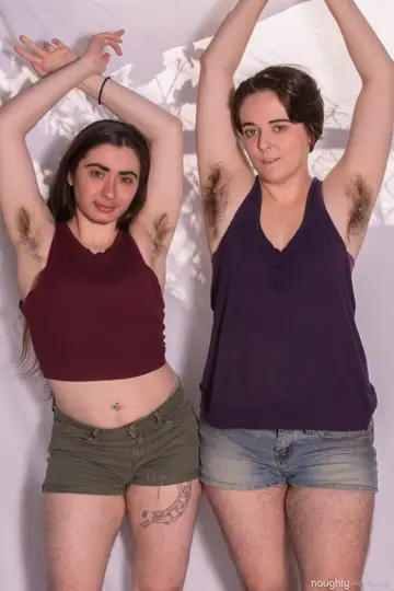 Harley Hex – Two Hairy Brunettes Strip Nude and Pose Together Showing Tattoos