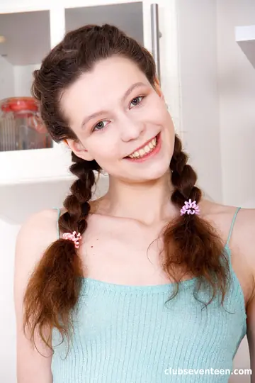 Sony Smile – European Brunette in Pigtails Fingers Her Pussy on the Kitchen Chair