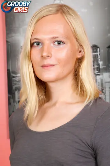 Blonde Trans Woman Strips Nude and Poses for the Lens
