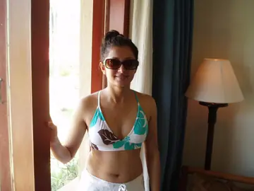 Indian Woman Poses in Lingerie, Skirt and Glasses Outdoors