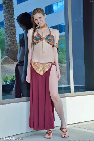 Eva Celeste – Brunette in Harem Costume and Bikini Works Toy in Her Ass Outdoors