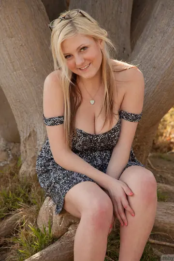 Curvy Blonde MILF Flashes Her Big Tits Outdoors in a Skirt