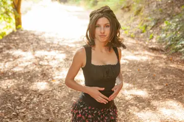 Brunette with Big Tits Strips Out of Her Top Outdoors