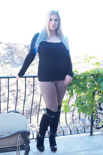 Busty Woman Strips Out of Riding Pants and Toys Her Pussy on the Terrace