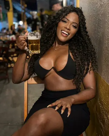 Latina Woman Strips Nude and Poses for the Camera