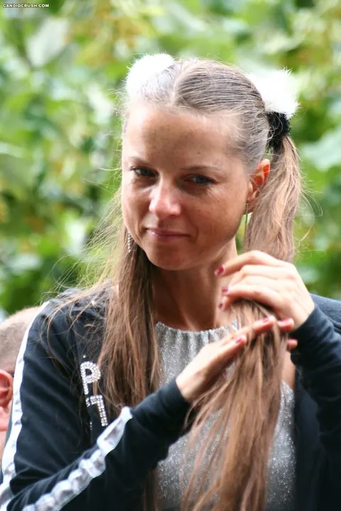 Woman in a Bikini and Skirt Exposes Her Small Breasts in Public – photo 8 of 16