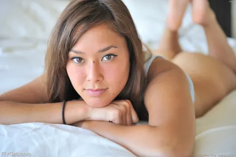 Busty Asian Woman Kisses and Spreads in the Bedroom – photo 10 of 15