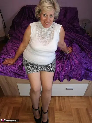 European Blonde in Lingerie Sniffs Panties and Fingers Her Pussy