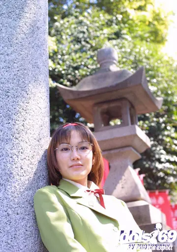 Japanese Woman in Uniform and Glasses Bares Her Breasts Outdoors