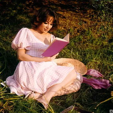Short-Haired Brunette with Big Tits Strips Out of Her Red Dress Outdoors