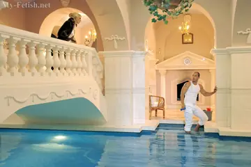 Blonde Strips in the Indoor Pool for Anal and a Facial