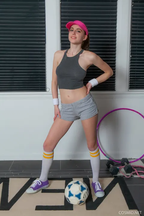 April Grantham: Athletic Brunette MILF Strips Off Her Socks and Spreads – photo 1 of 16