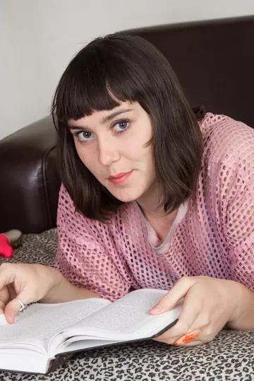 Pale Brunette Undresses and Toys Her Hairy Pussy