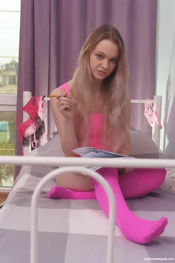 European Blonde Strips Nude and Poses to Show Her Body