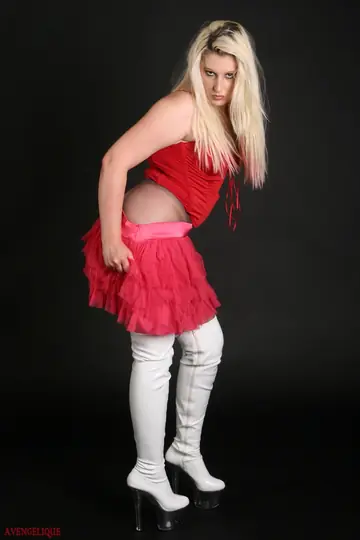 Blonde BBW Peels Off Her Skirt in Pantyhose, Boots, and Latex