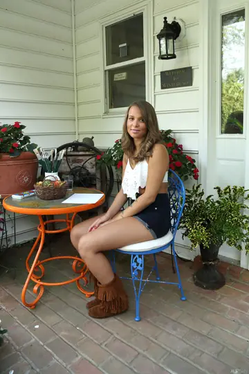 Brunette in Shorts Spreads Her Shaved Pussy Outdoors