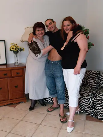 Busty Hairy Woman in Lingerie Has a Threesome on the Sofa