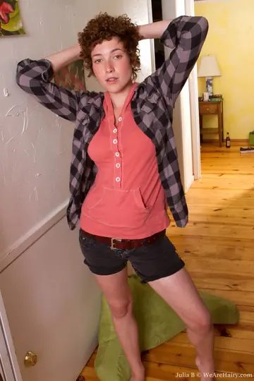 Amateur Curly Woman Spreads Her Hairy Pussy in the Hallway
