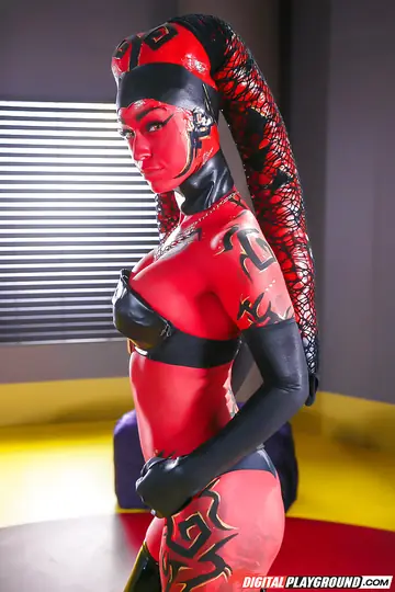 Kleio Valentien – Redhead in Cosplay Lingerie and Latex Boots Spreads Her Pussy